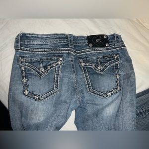 Miss me ripped from bottom a bit